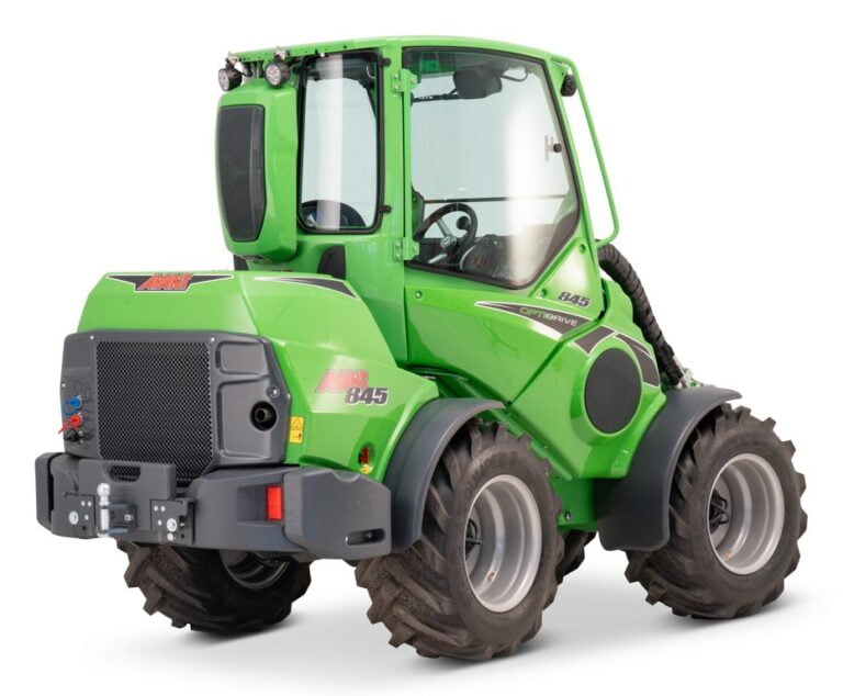 Rear and side view of the Avant 845 GT mini loader with an enclosed cabin and large rugged tires, showcasing its sturdy build and rear panel for heavy-duty industrial tasks.