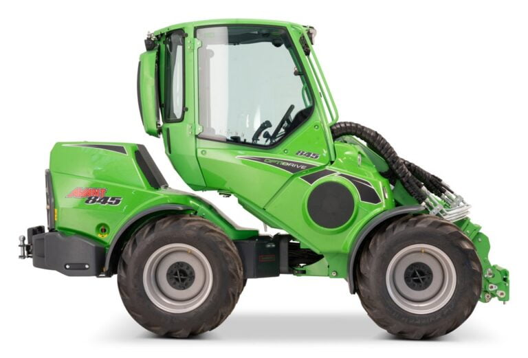 Side view of the Avant 845 GT mini loader, featuring an enclosed cabin, large rugged tires, and hydraulic attachments, designed for heavy-duty tasks in various industries