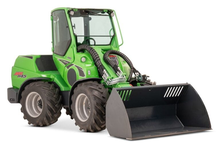 Avant 845 GT mini loader with an enclosed cabin and equipped with a bucket attachment. The green loader features large, rugged tires and is designed for heavy-duty tasks in agriculture, construction, and industrial applications.