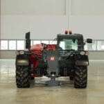 Front view of the Magni TH 5.8P telescopic handler in an indoor facility.